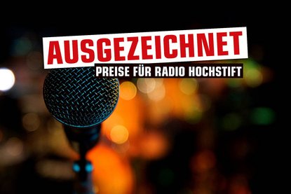 Ausgezeichnet Schriftzug auf dem Motiv eine Mirkofons